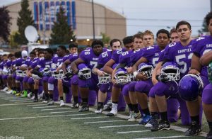 Students at Garfield High School in Seattle kneeling for national anthem. Photo from Seattle Times newspaper.